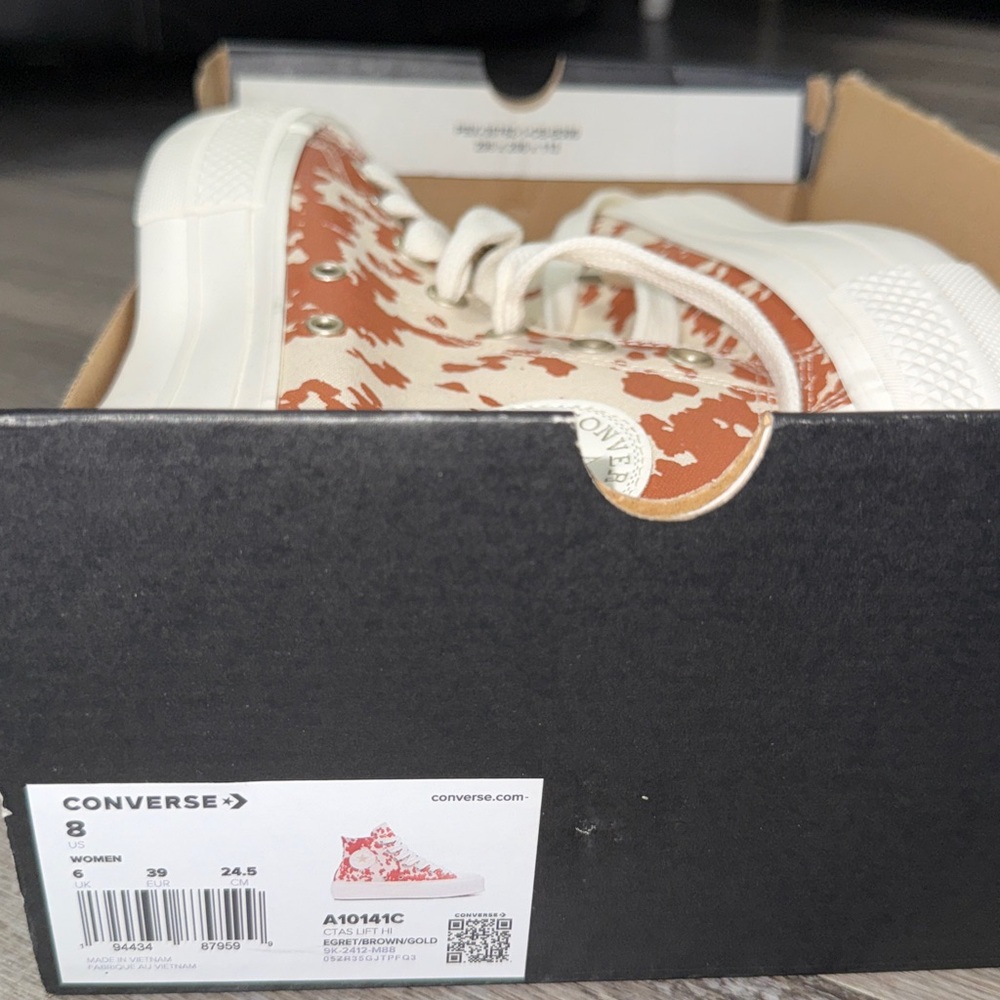 Converse High-Tops in Brown and White